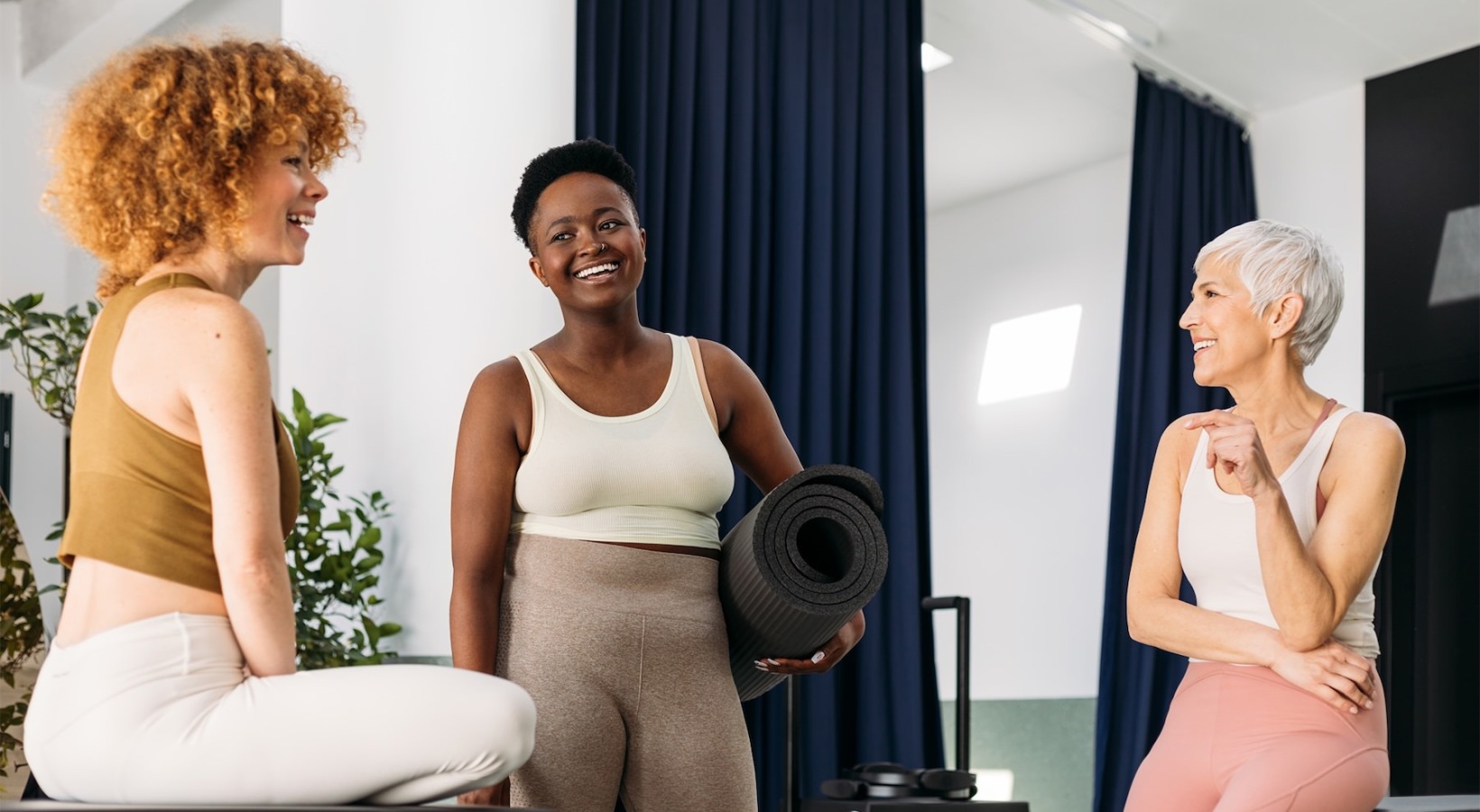 women talking and smiling